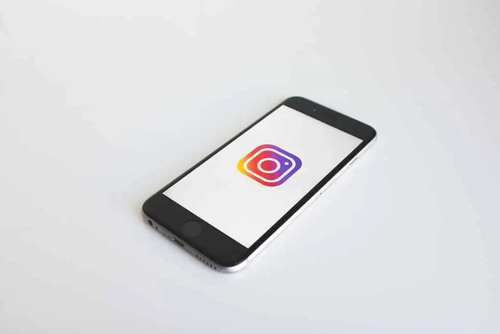 Phone with Instagram logo. This means that you can offer takeaway through social media.