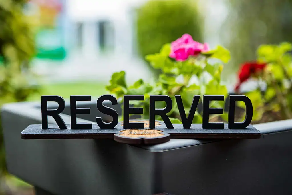 reserved table restaurant sign